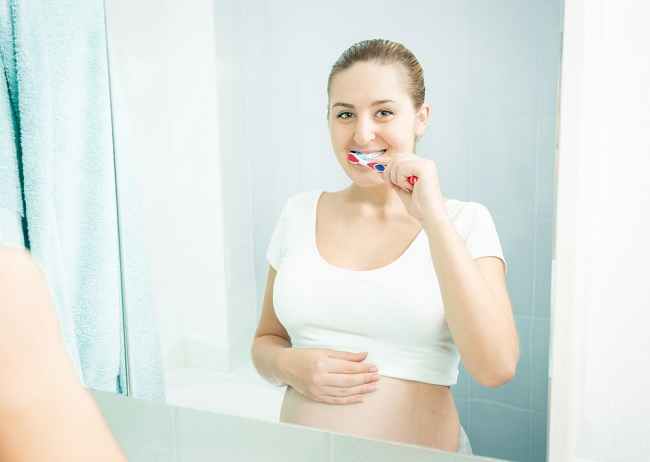  Cách duy trì sức khỏe răng miệng khi mang thai-dsuckhoe 